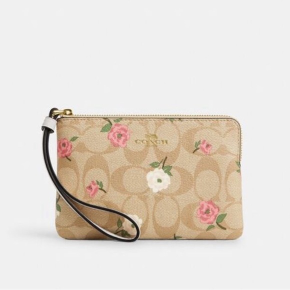 Coach Handbags - NWT Coach Corner Zip Wristlet In Signature Canvas With Floral Print